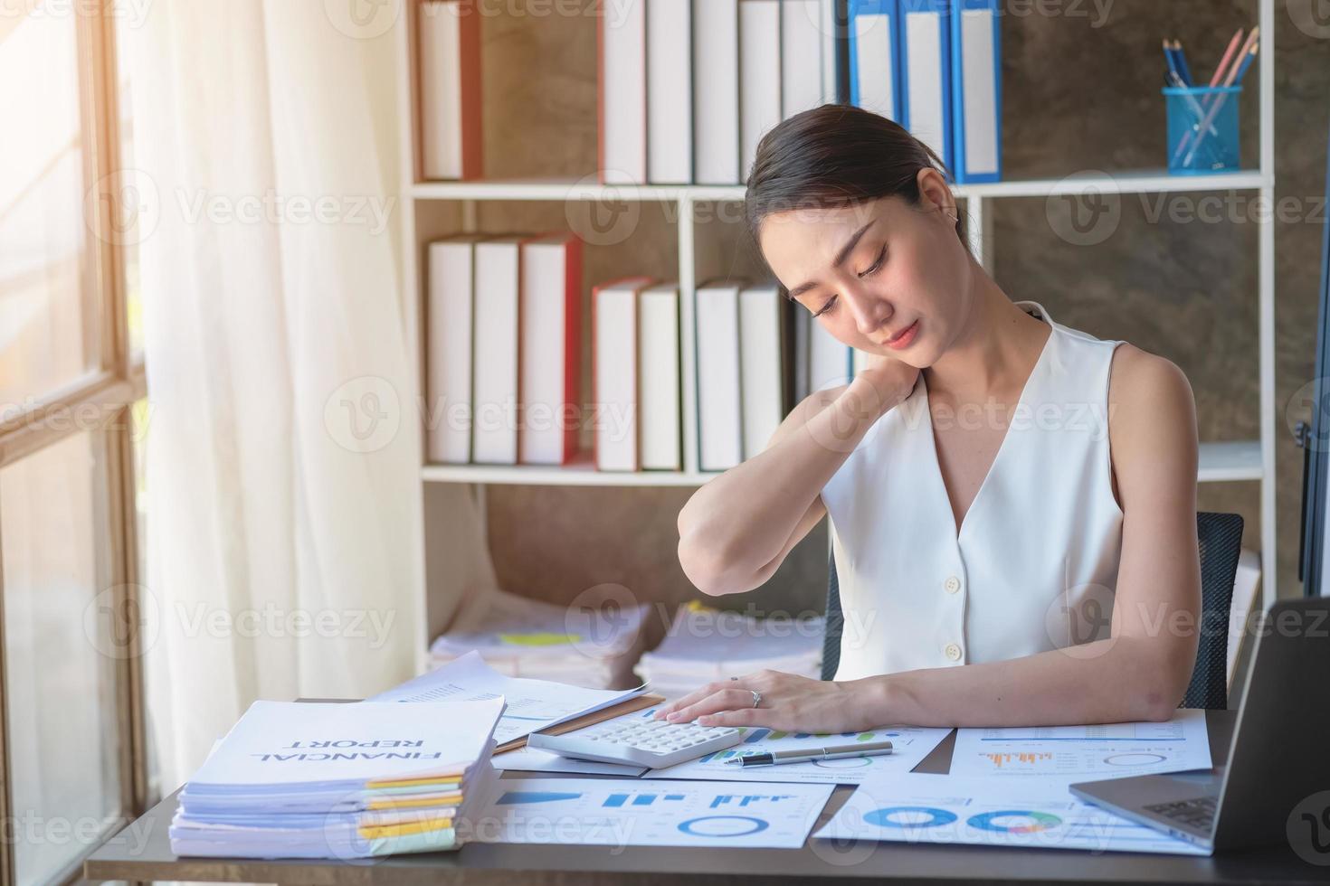 Concept Burnout Syndrome. Business Woman feels uncomfortable working. Which is caused by stress, accumulated from unsuccessful work And less resting body. Consult a specialist psychiatrist. photo