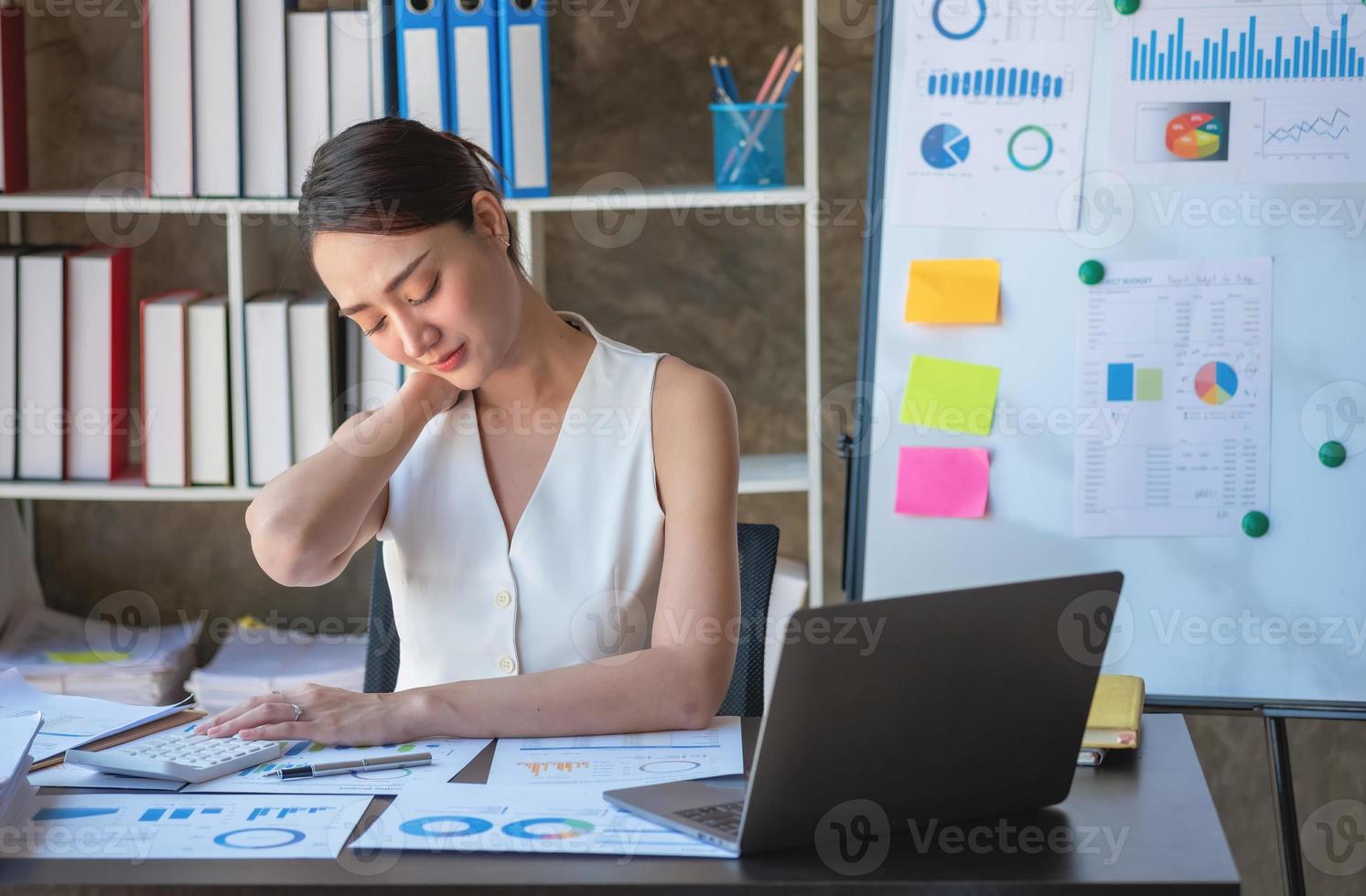 Concept Burnout Syndrome. Business Woman feels uncomfortable working. Which is caused by stress, accumulated from unsuccessful work And less resting body. Consult a specialist psychiatrist. photo