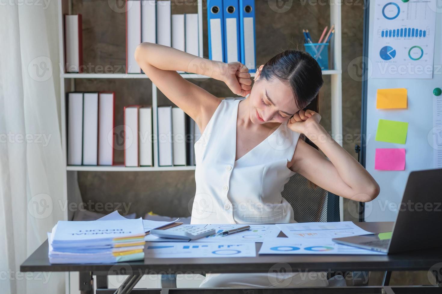 Concept Burnout Syndrome. Business Woman feels uncomfortable working. Which is caused by stress, accumulated from unsuccessful work And less resting body. Consult a specialist psychiatrist. photo