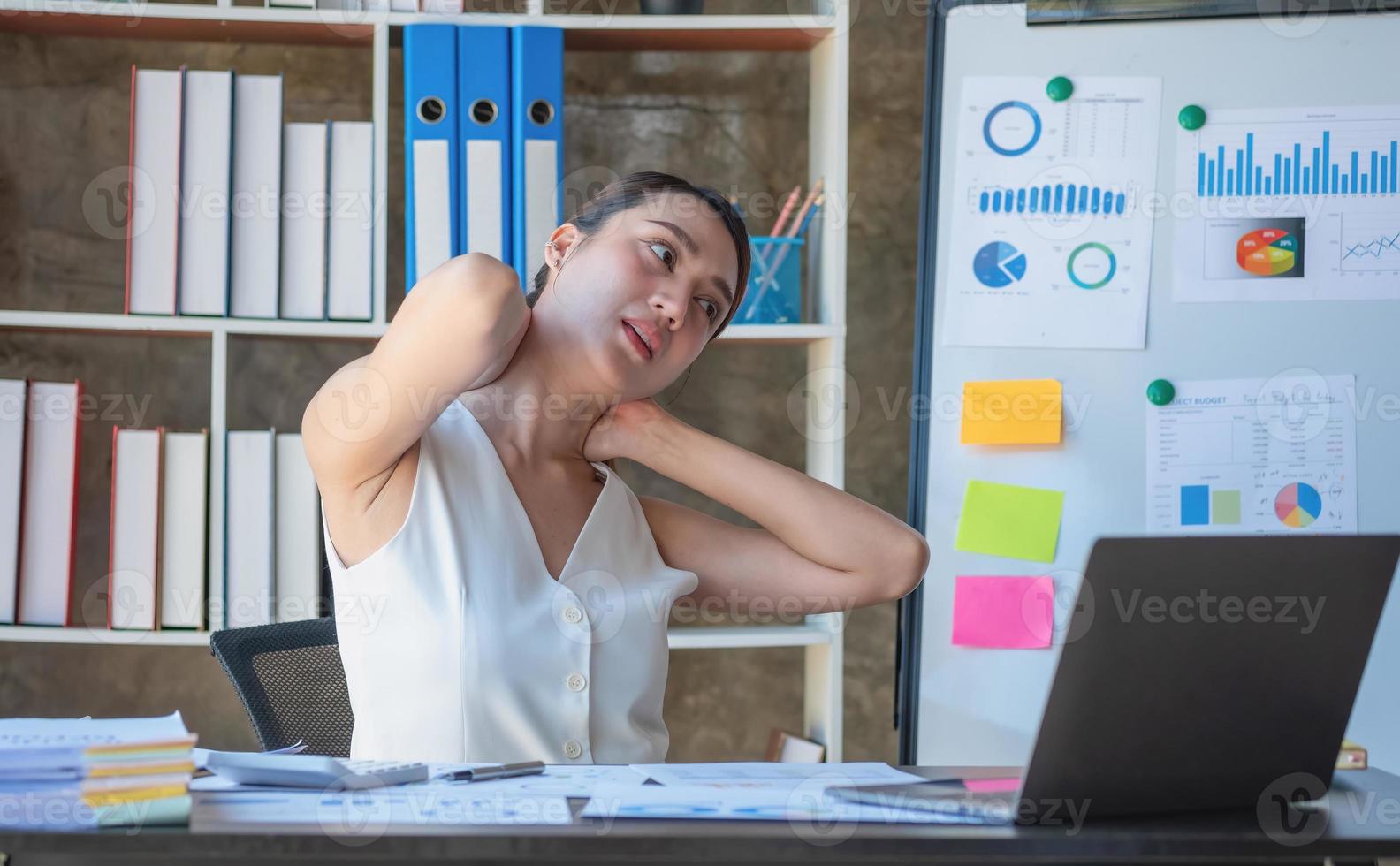 Concept Burnout Syndrome. Business Woman feels uncomfortable working. Which is caused by stress, accumulated from unsuccessful work And less resting body. Consult a specialist psychiatrist. photo