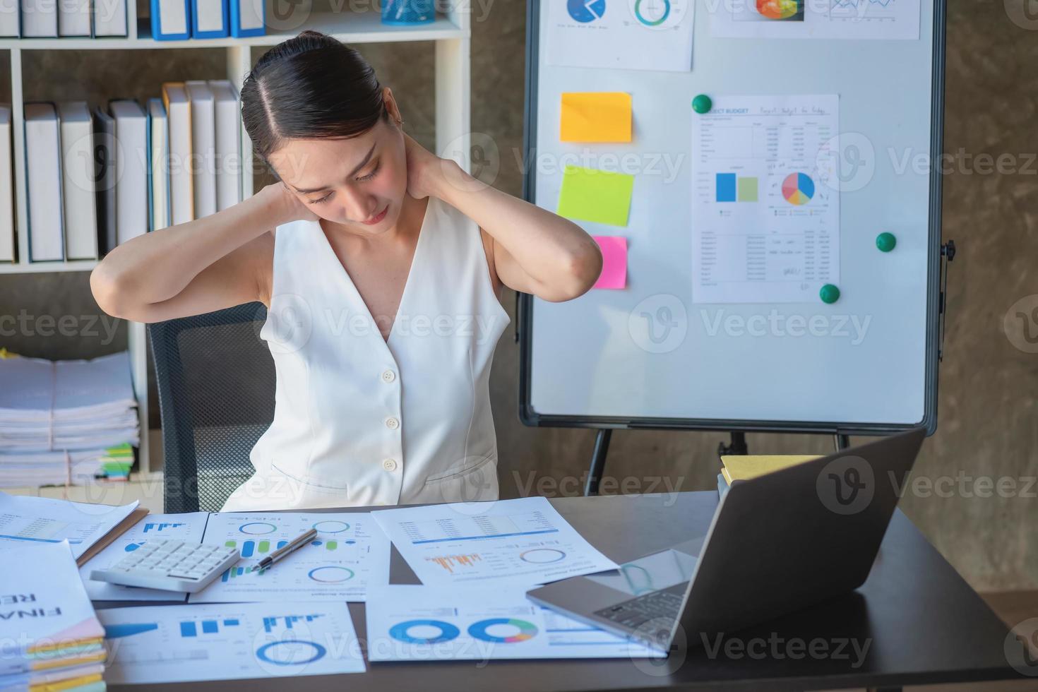 Concept Burnout Syndrome. Business Woman feels uncomfortable working. Which is caused by stress, accumulated from unsuccessful work And less resting body. Consult a specialist psychiatrist. photo