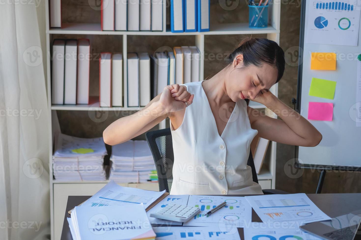 Concept Burnout Syndrome. Business Woman feels uncomfortable working. Which is caused by stress, accumulated from unsuccessful work And less resting body. Consult a specialist psychiatrist. photo