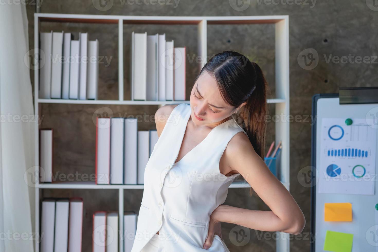Concept Burnout Syndrome. Business Woman feels uncomfortable working. Which is caused by stress, accumulated from unsuccessful work And less resting body. Consult a specialist psychiatrist. photo