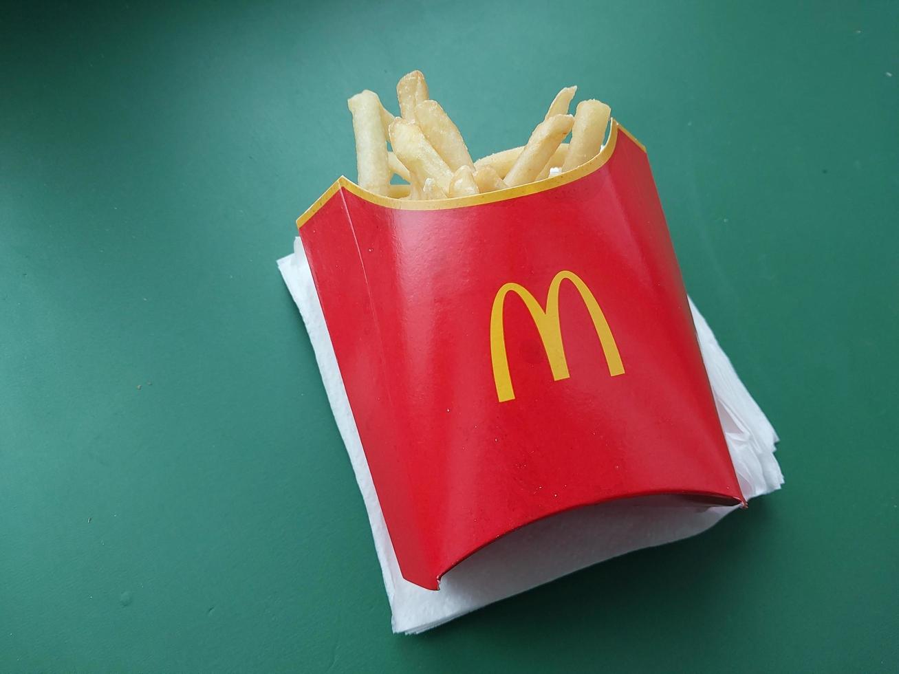 KYIV, UKRAINE - JANUARY 15, 2023 Food from McDonald's Big Mac with potatoes photo