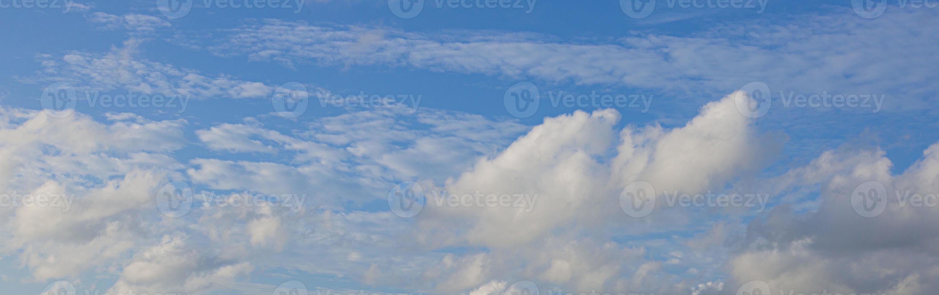 Image of a partly cloudy and partly clear sky during the day photo