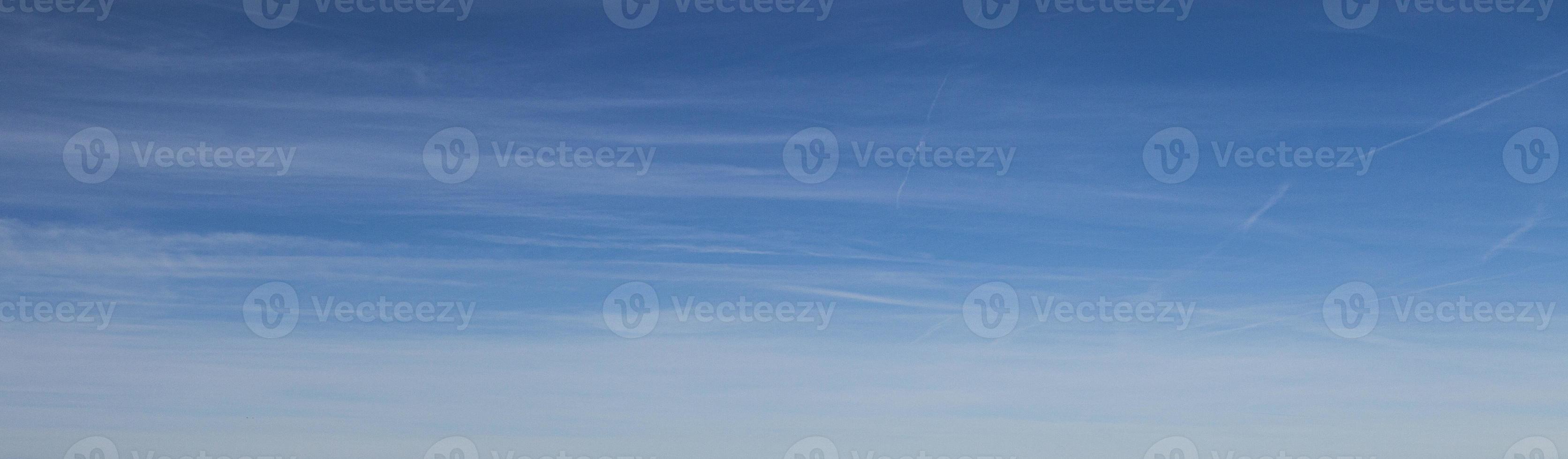 Image of a partly cloudy and partly clear sky during the day photo