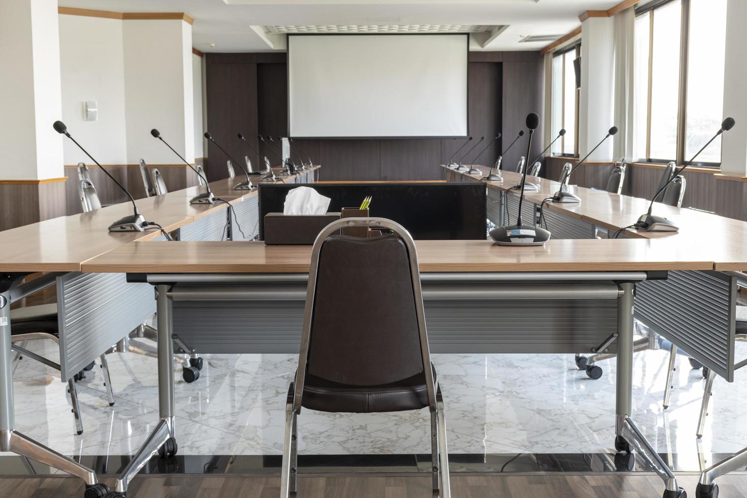 Back view of chair for president in meeting room photo
