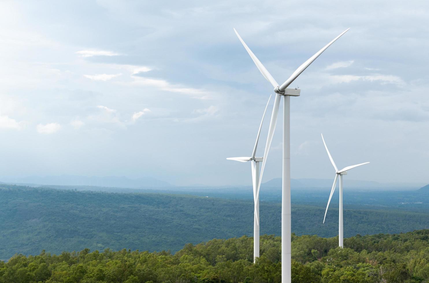 Wind turbines on yellow sky photo