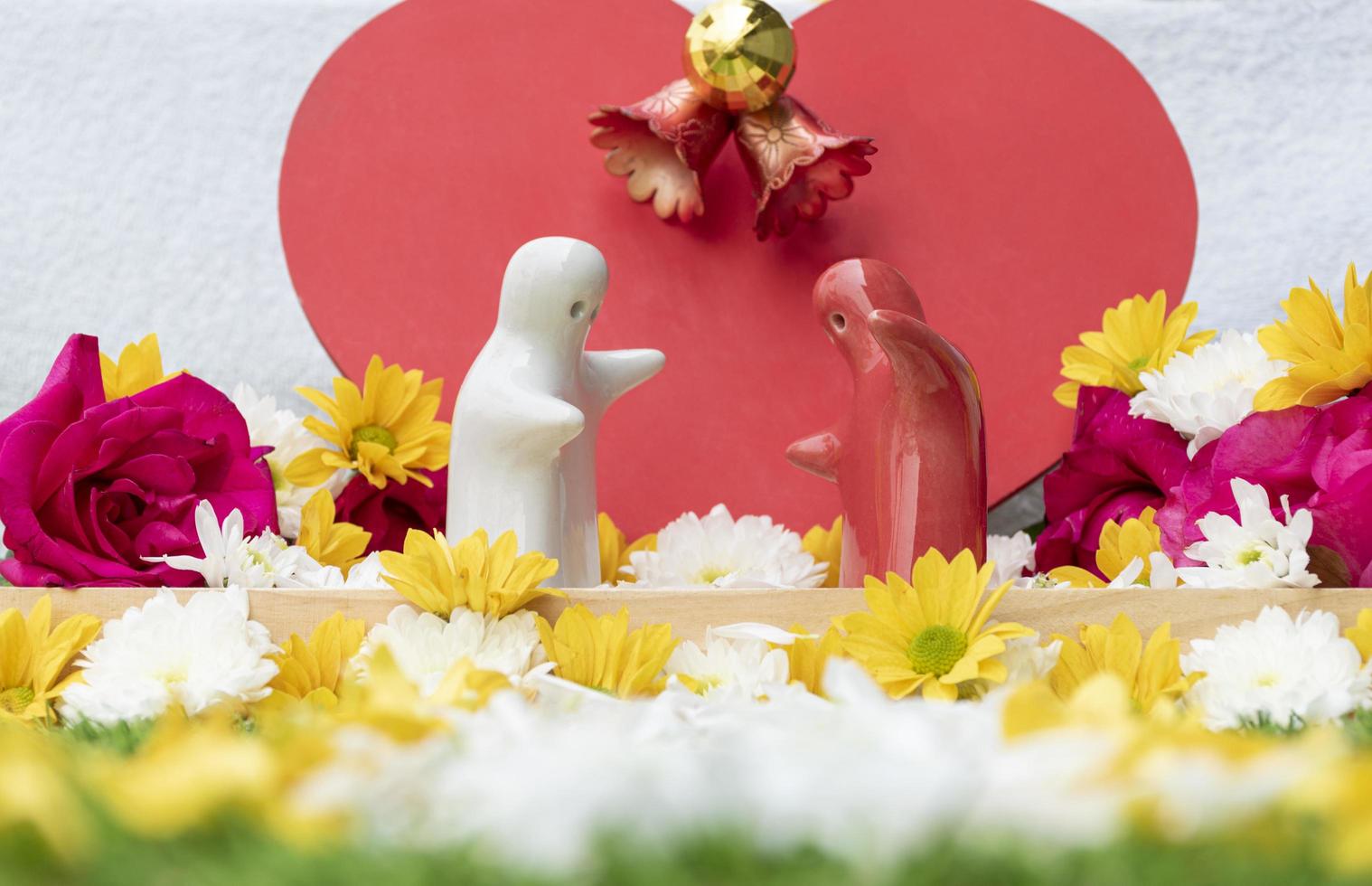 Mock up couple hugging at simulated wedding decorated with roses and flowers. Valentine day concept photo