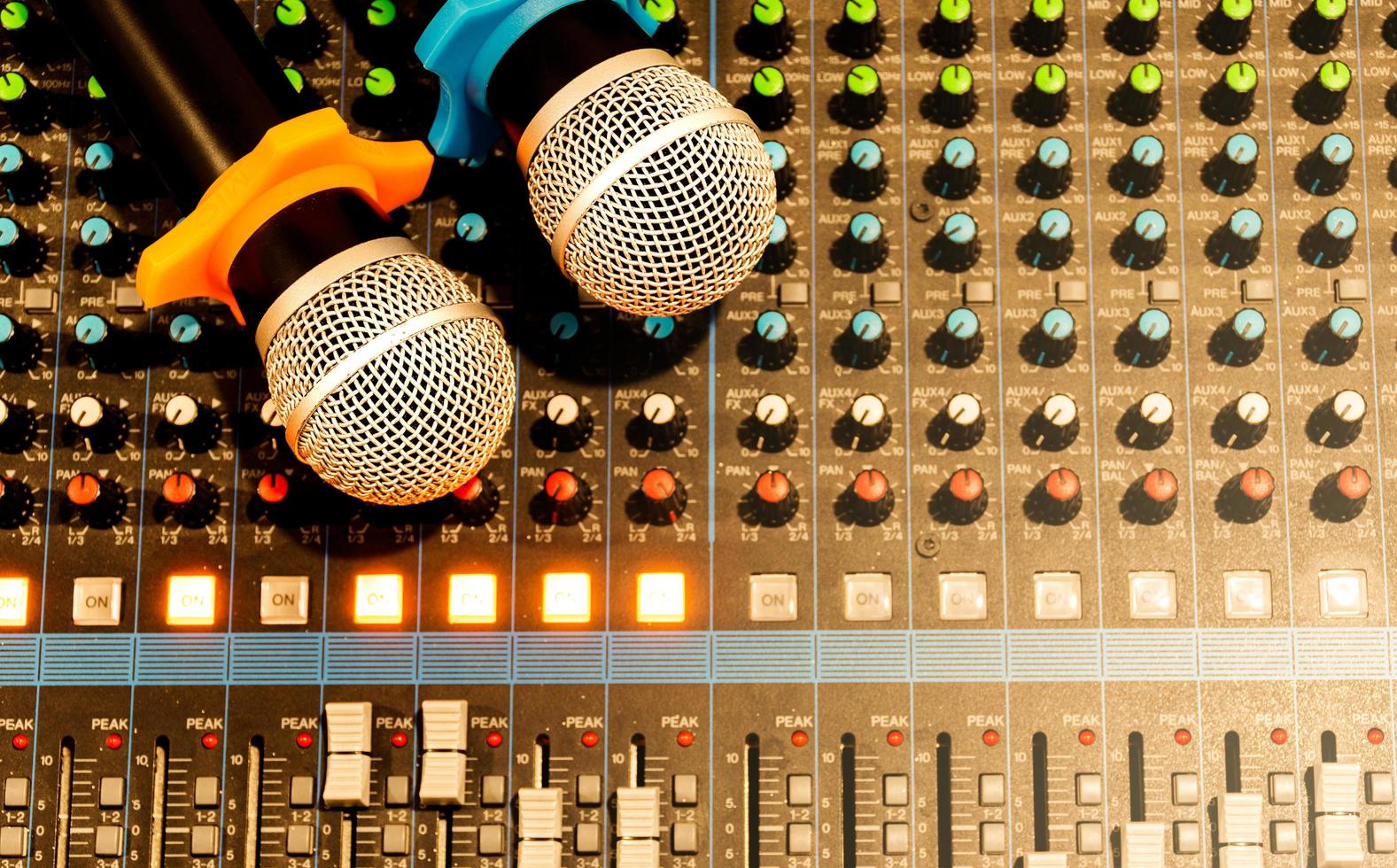 Top view microphone on console sound board mixer photo