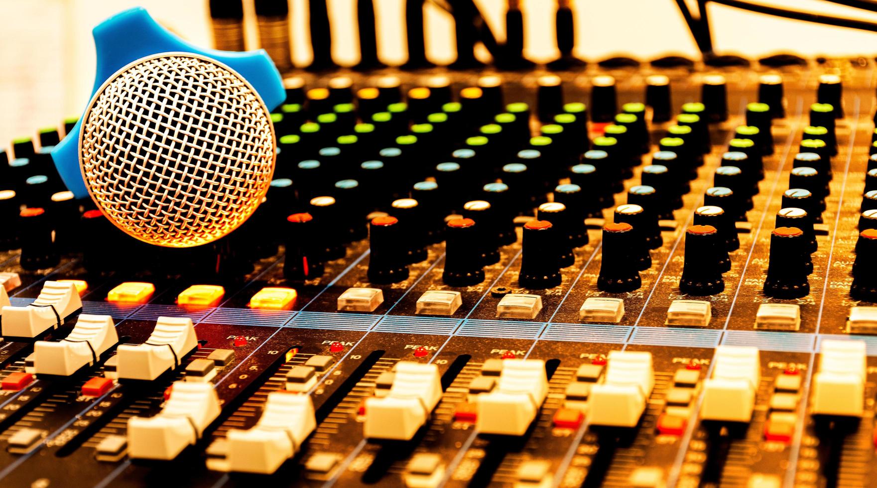 Microphone on console sound board mixer photo