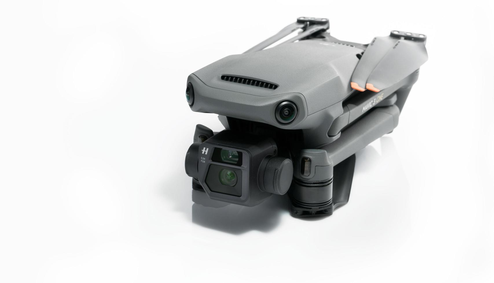 CHONBURI, THAILAND-OCTOBER 31, 2022 DJI Mavic 3 Cine drone on white background. UAV or unmanned aerial vehicle. Quadcopter drone aircraft with digital camera. Modern remote control aerial drone. photo