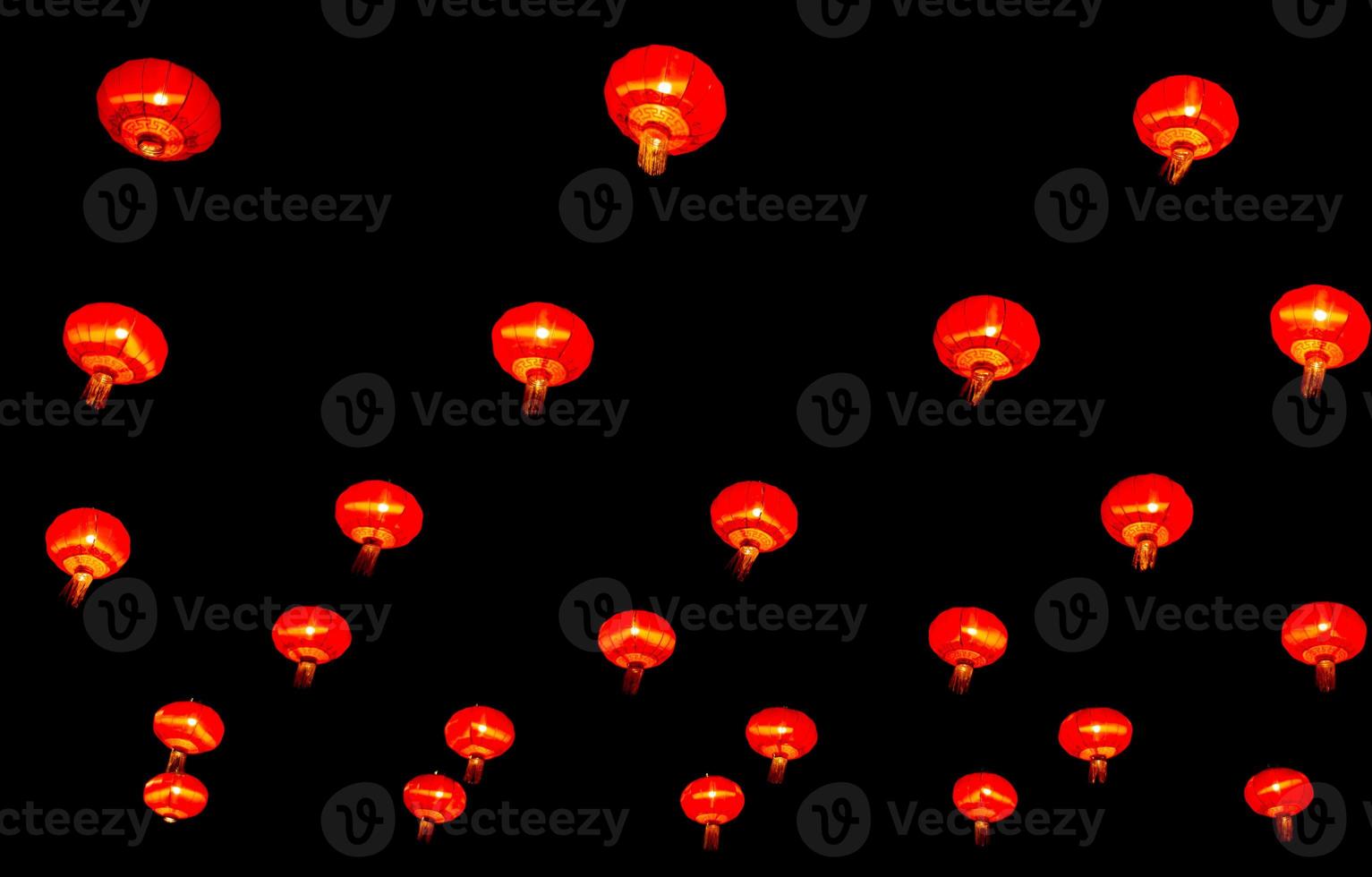 Chinese lantern in new year festival, red lanterns are hung as pattern,black background,Chinese new year concept. photo