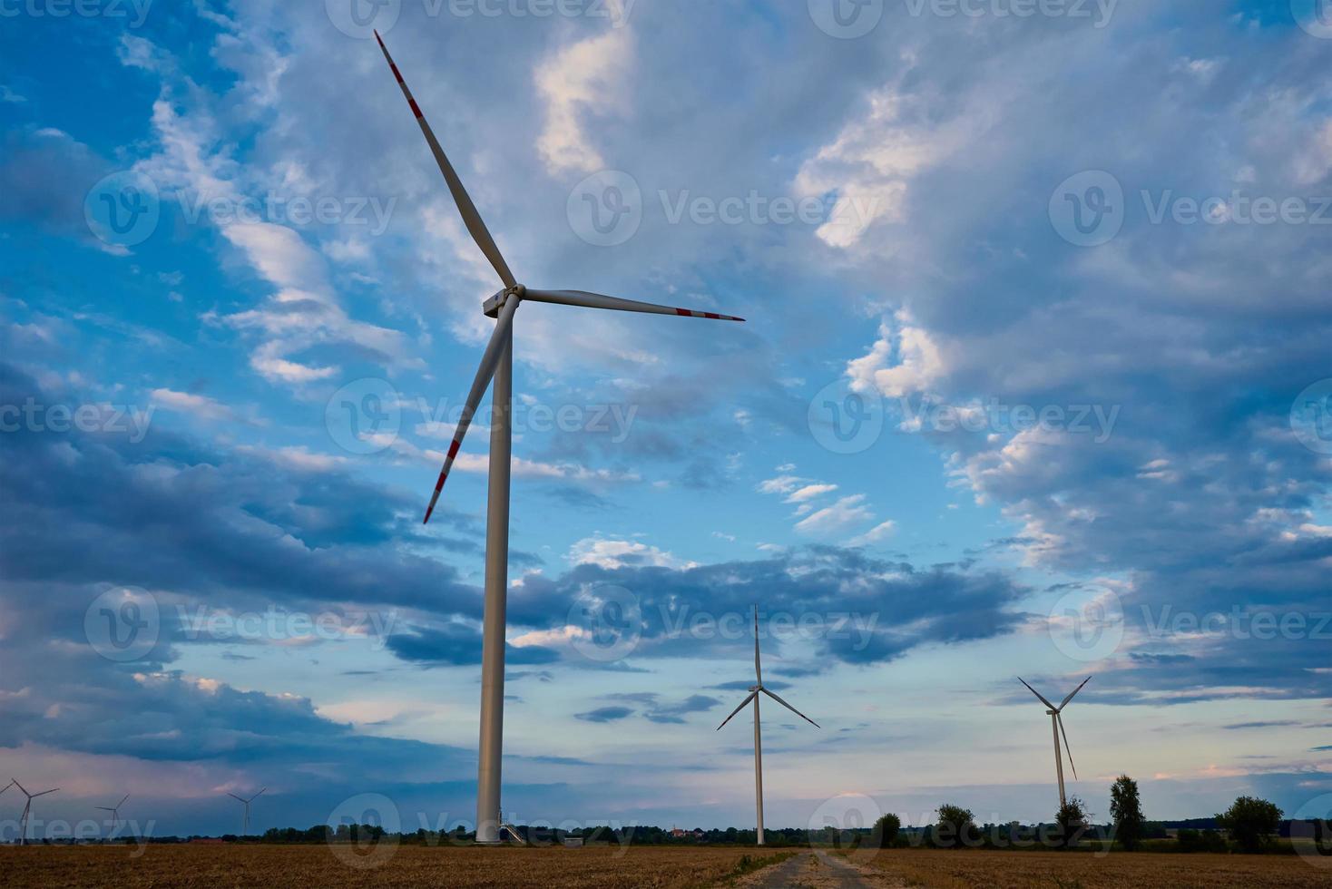 Wind turbine in the field photo