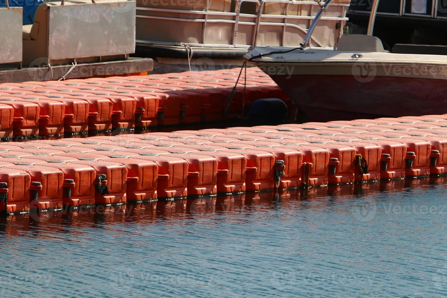 Berth on the seashore for mooring boats and yachts. photo