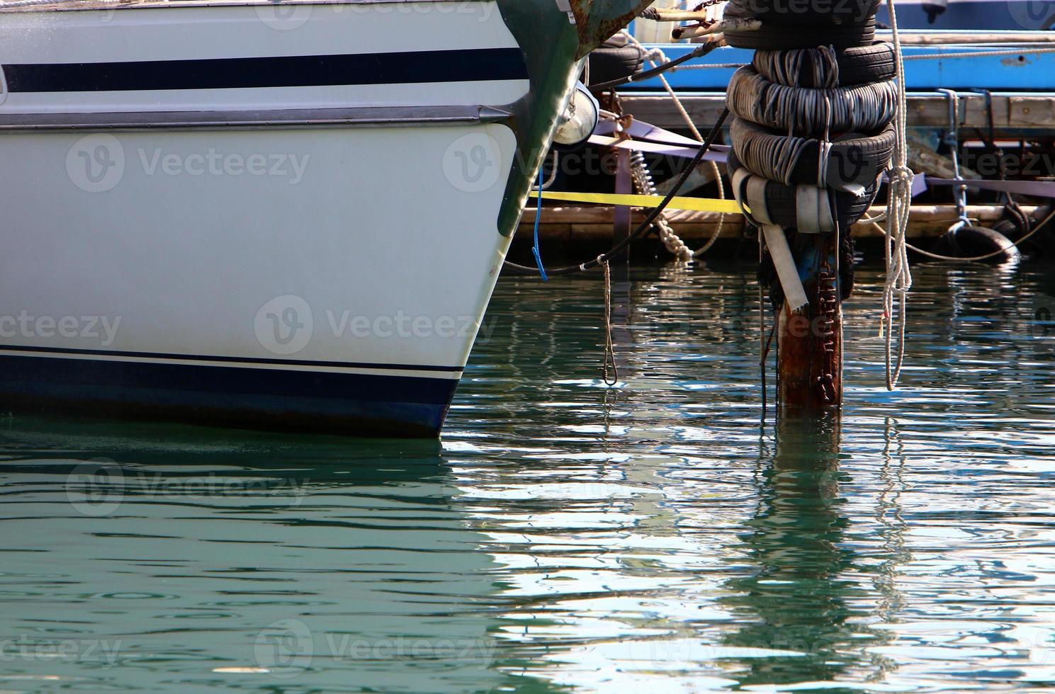 Berth on the seashore for mooring boats and yachts. photo