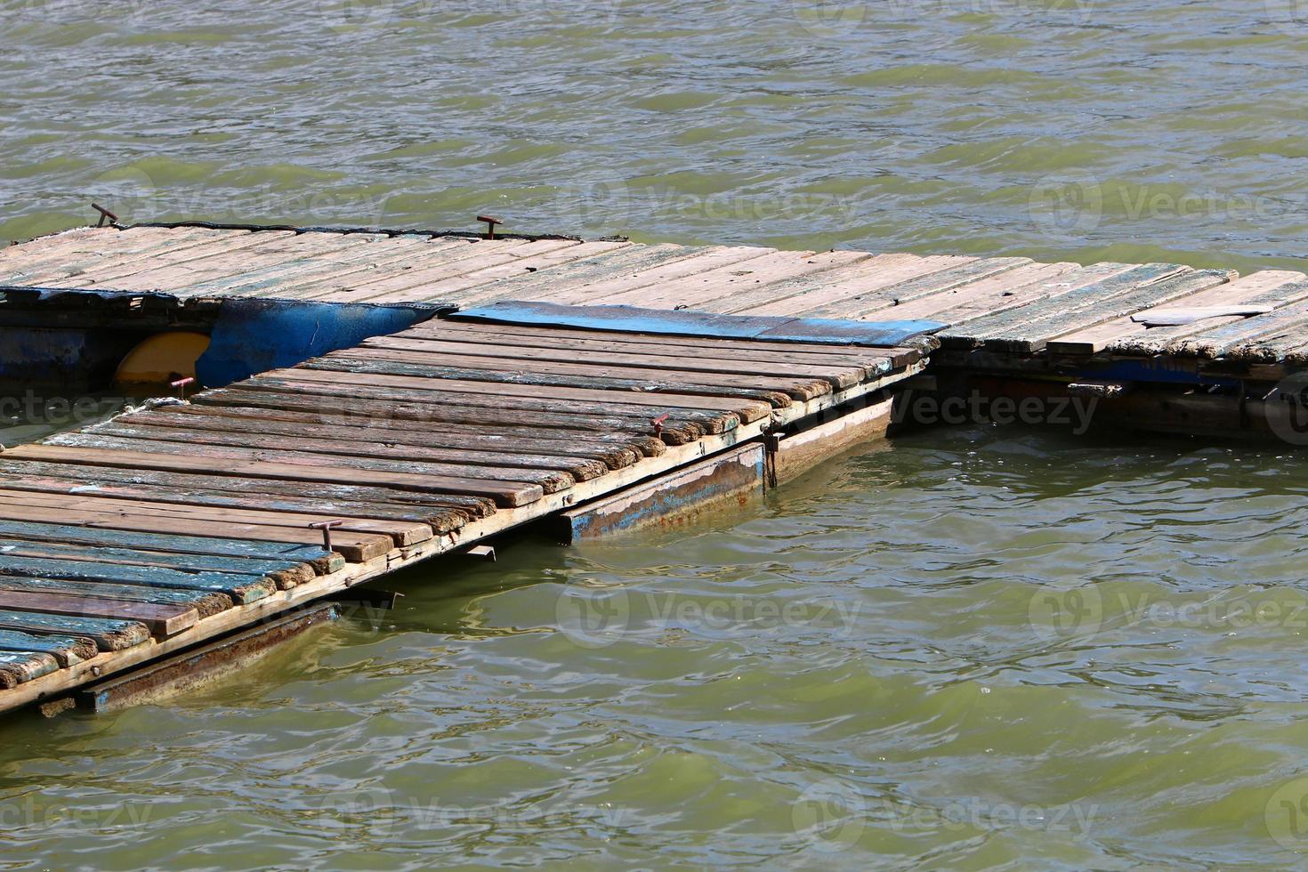 Berth on the seashore for mooring boats and yachts. photo