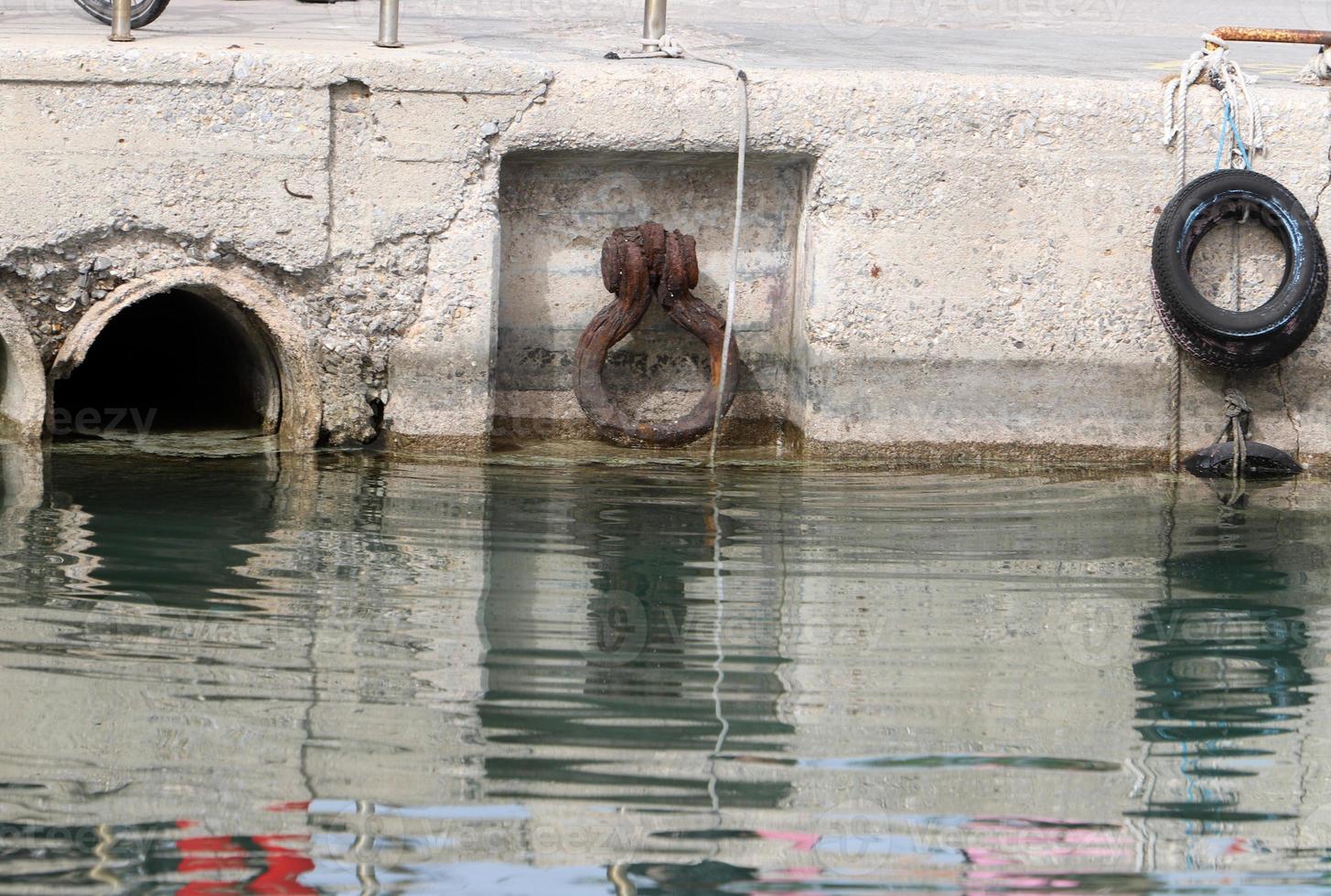 Berth on the seashore for mooring boats and yachts. photo