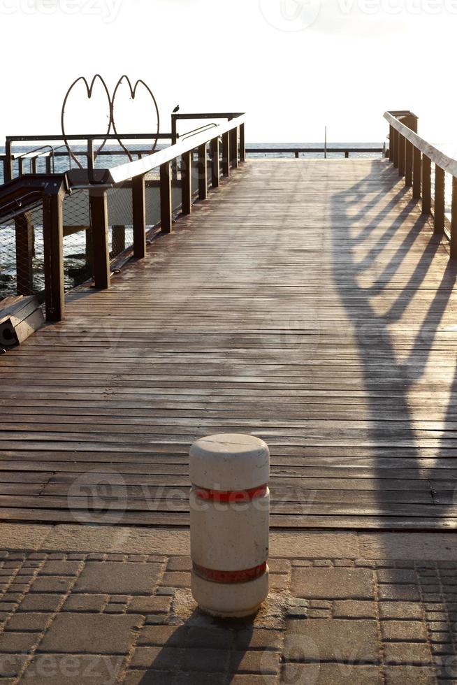 Berth on the seashore for mooring boats and yachts. photo