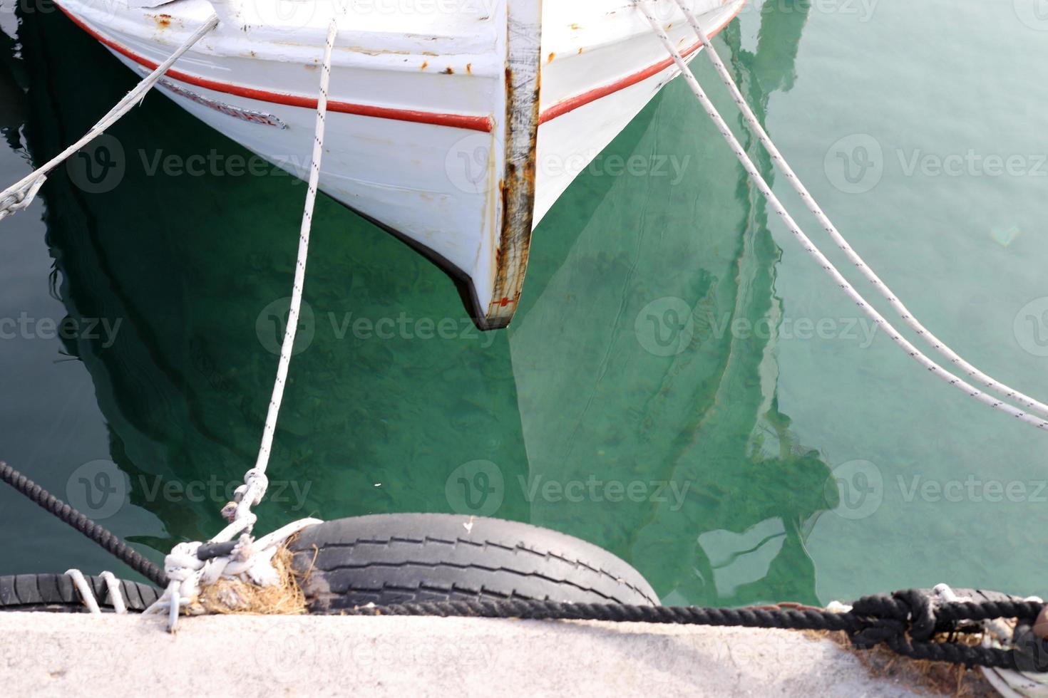 Berth on the seashore for mooring boats and yachts. photo