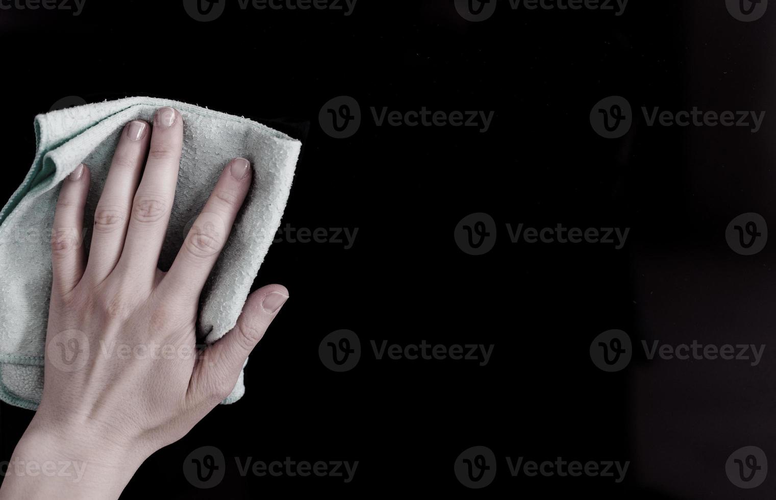 Hand Cleaning Television With Cloth photo