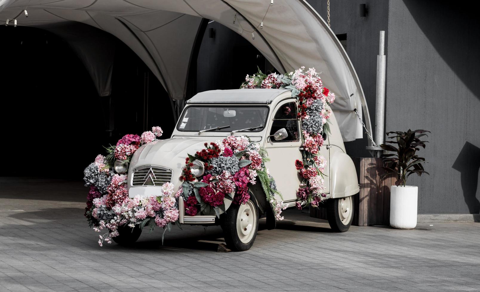 Minsk, Belarus, January 2023 - Vintage Citroen car with  flowers photo