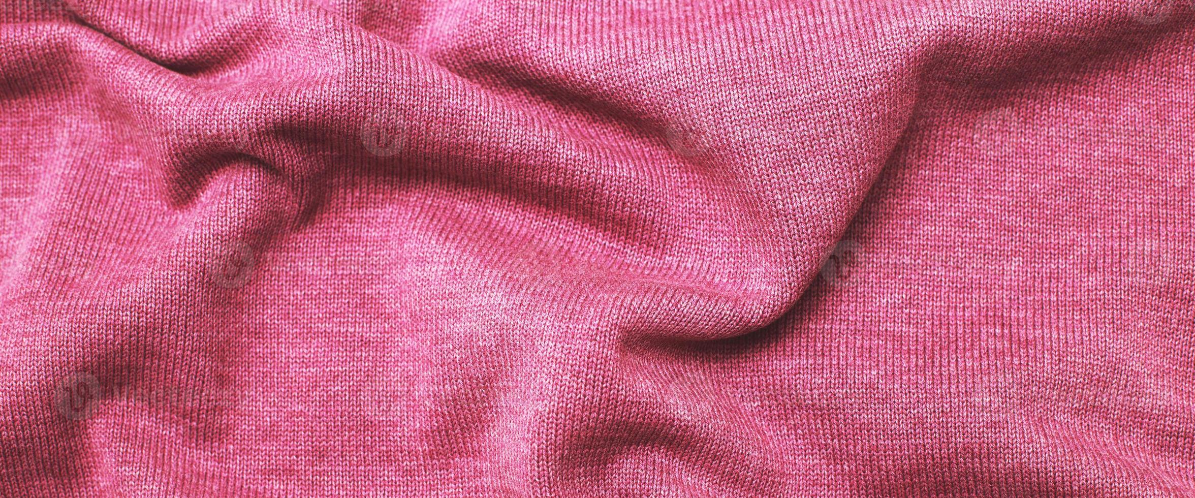 burgundy viva magenta wrinkled plush fabric background texture, soft material pattern. banner photo
