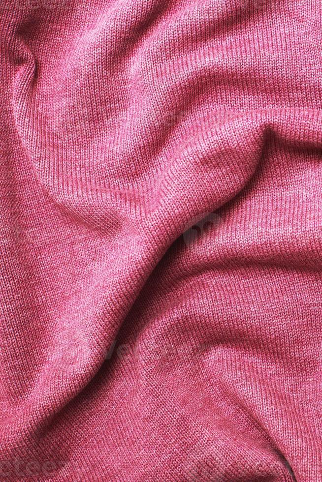 burgundy viva magenta wrinkled plush fabric background texture, soft material pattern photo