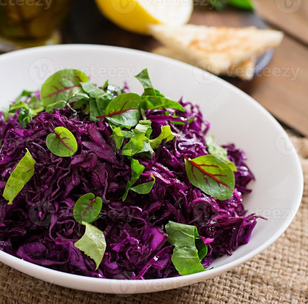 Salad of red cabbage with herbs photo
