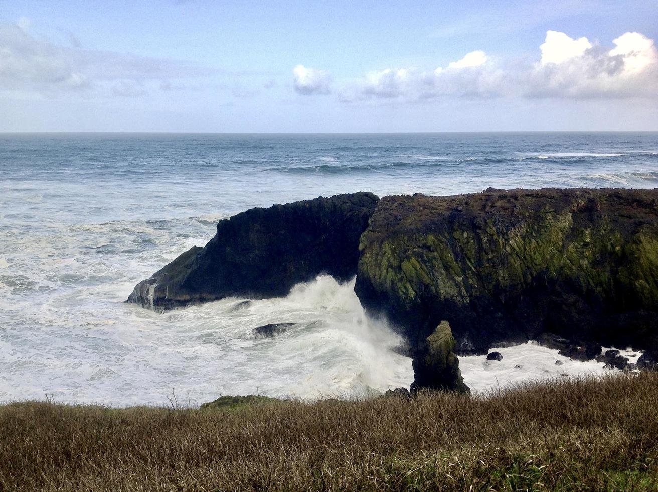 waves crashing into the Oregon coast photo