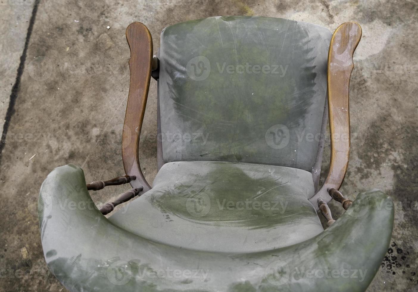 Old damaged armchair photo