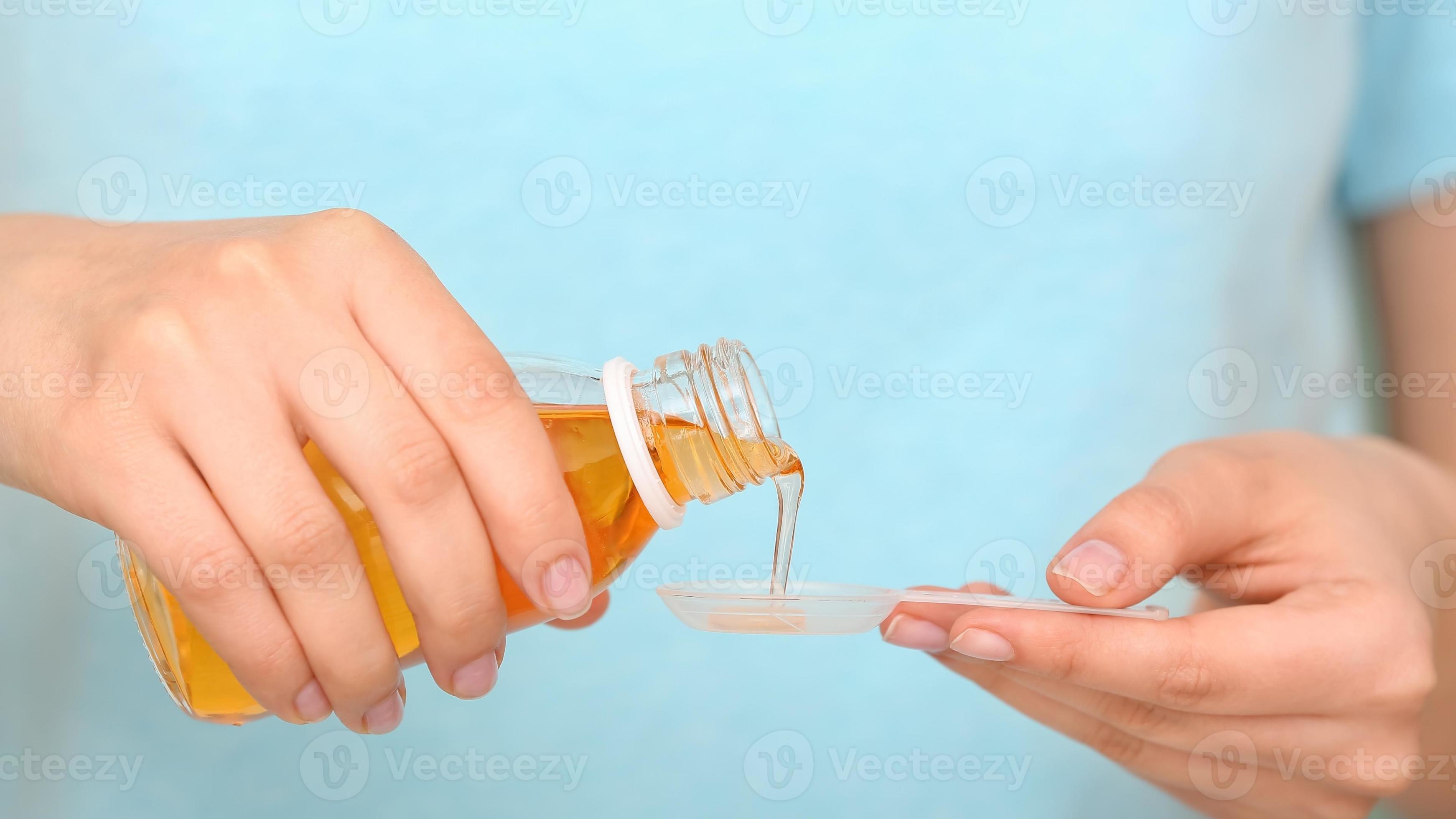 Concept Pouring Liquid Medication, Medicine Syrup Bottle 17535734 Stock