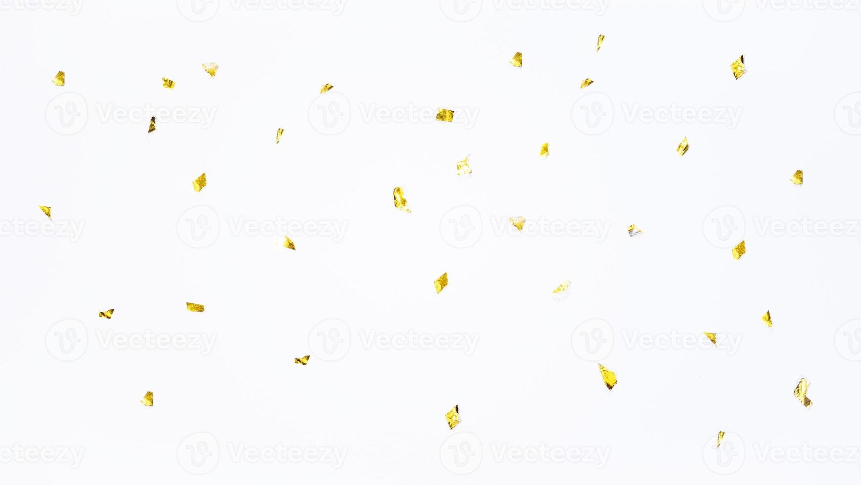 Abstract golden confetti particle pattern for luxury background photo