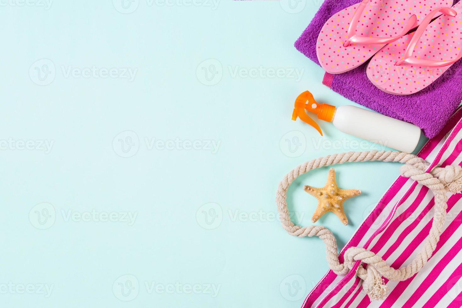 Summer bag background with copy space. Flat lay photo on color table, travel concept. Free space for text, mock-up