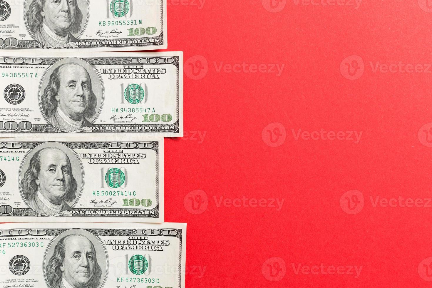 one hundred dollar bills Top view of business concept on background with copy space photo