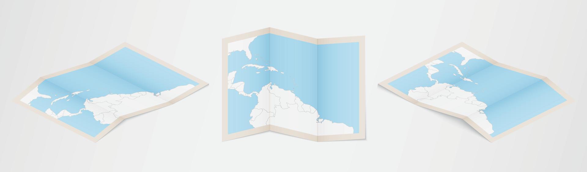 Folded map of Grenada in three different versions. vector