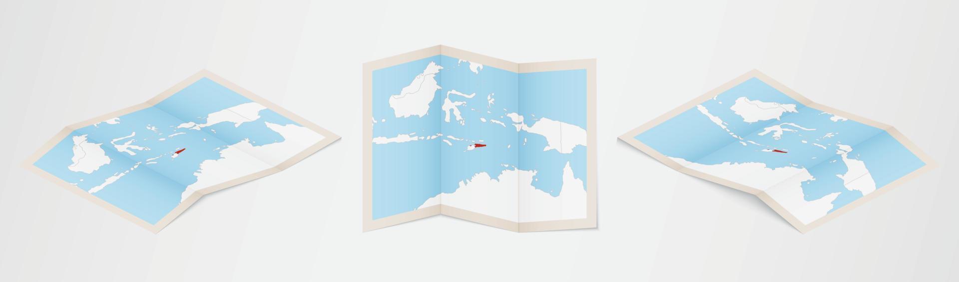 Folded map of East Timor in three different versions. vector