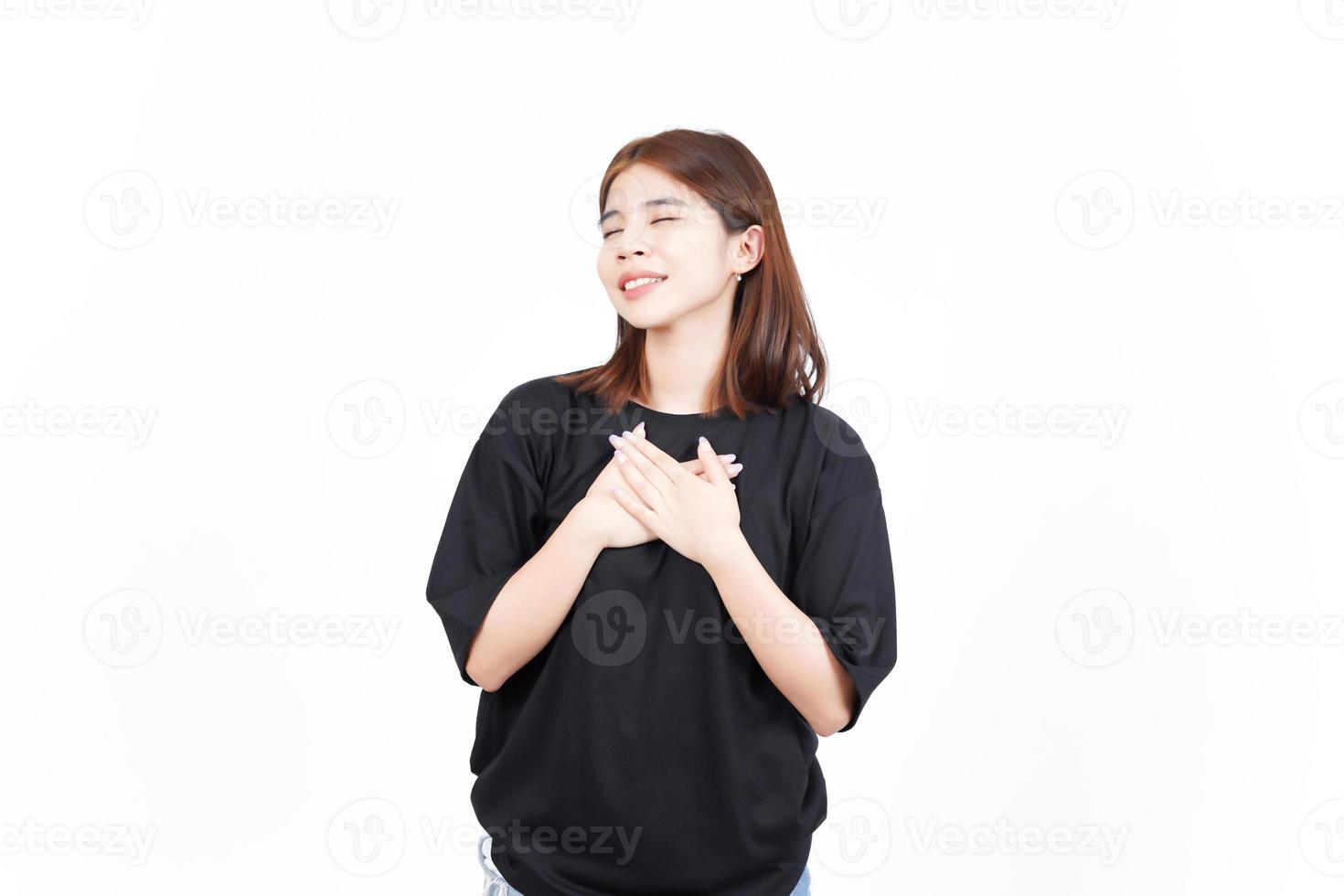 Hands on Chest Grateful Gesture Of Beautiful Asian Woman Isolated On White Background photo