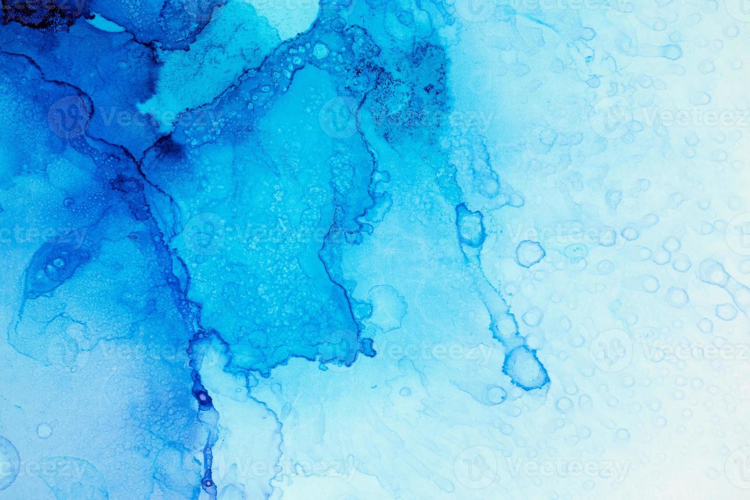 Blue ink drops and splotches background photo