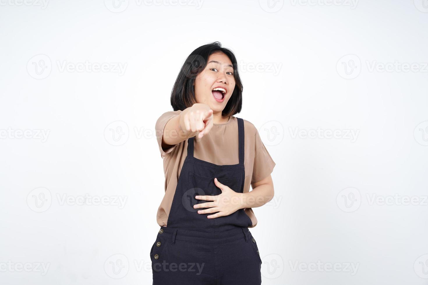 Pointing at you and Laughing of Beautiful Asian Woman Isolated On White Background photo