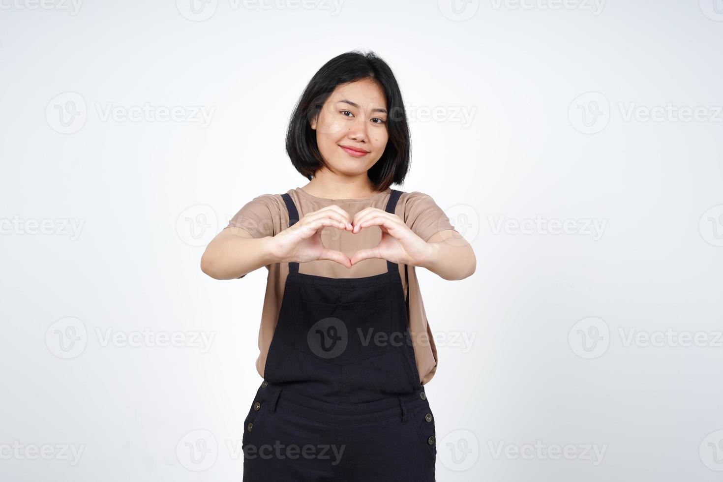 Showing Love Heart Sign of Beautiful Asian Woman Isolated On White Background photo