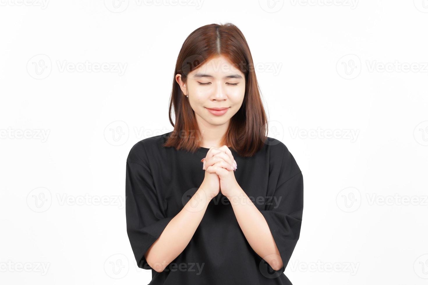 Fold Hand and Pray Of Beautiful Asian Woman Isolated On White Background photo
