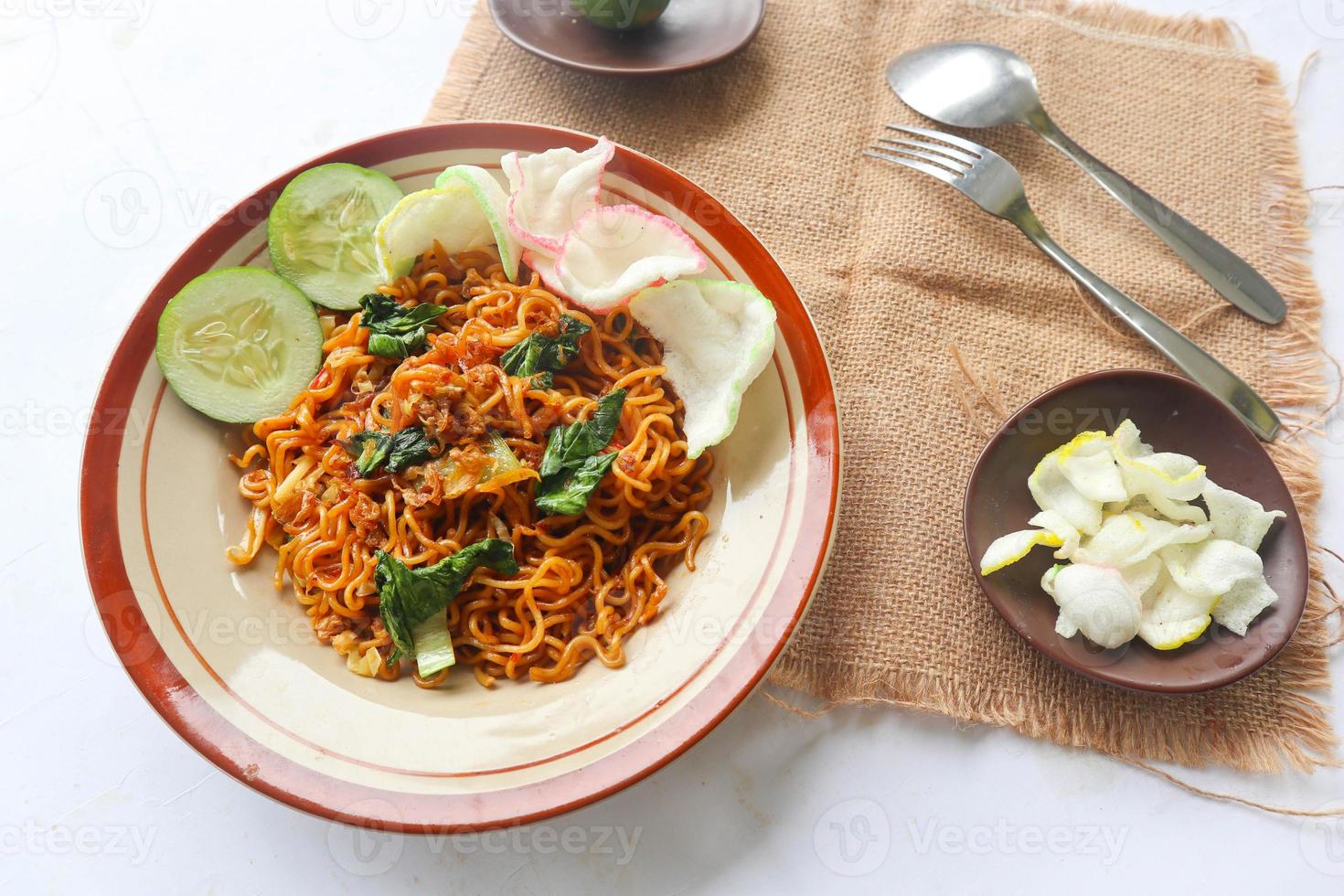 mie tek tek or fried noodle made with egg noodles with chicken, cabbage