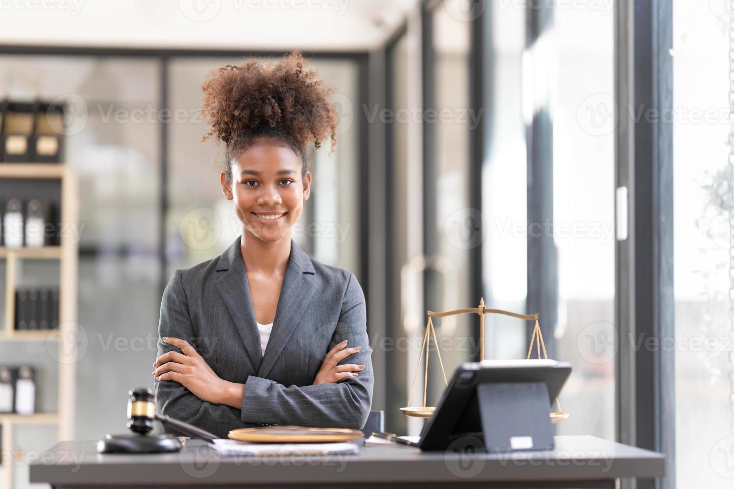 justice and law concept.Male judge in a courtroom on wooden table and Counselor or Portrait asian lawyer working with lsptop in office. Legal law, advice and justice concept photo