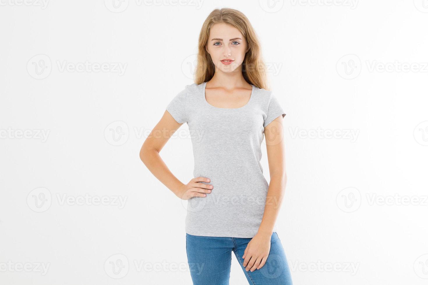 Young blonde woman with fit slim body in blank template t shirt and jeans isolated on white background. Skin and hair care. Copy space and mock up photo