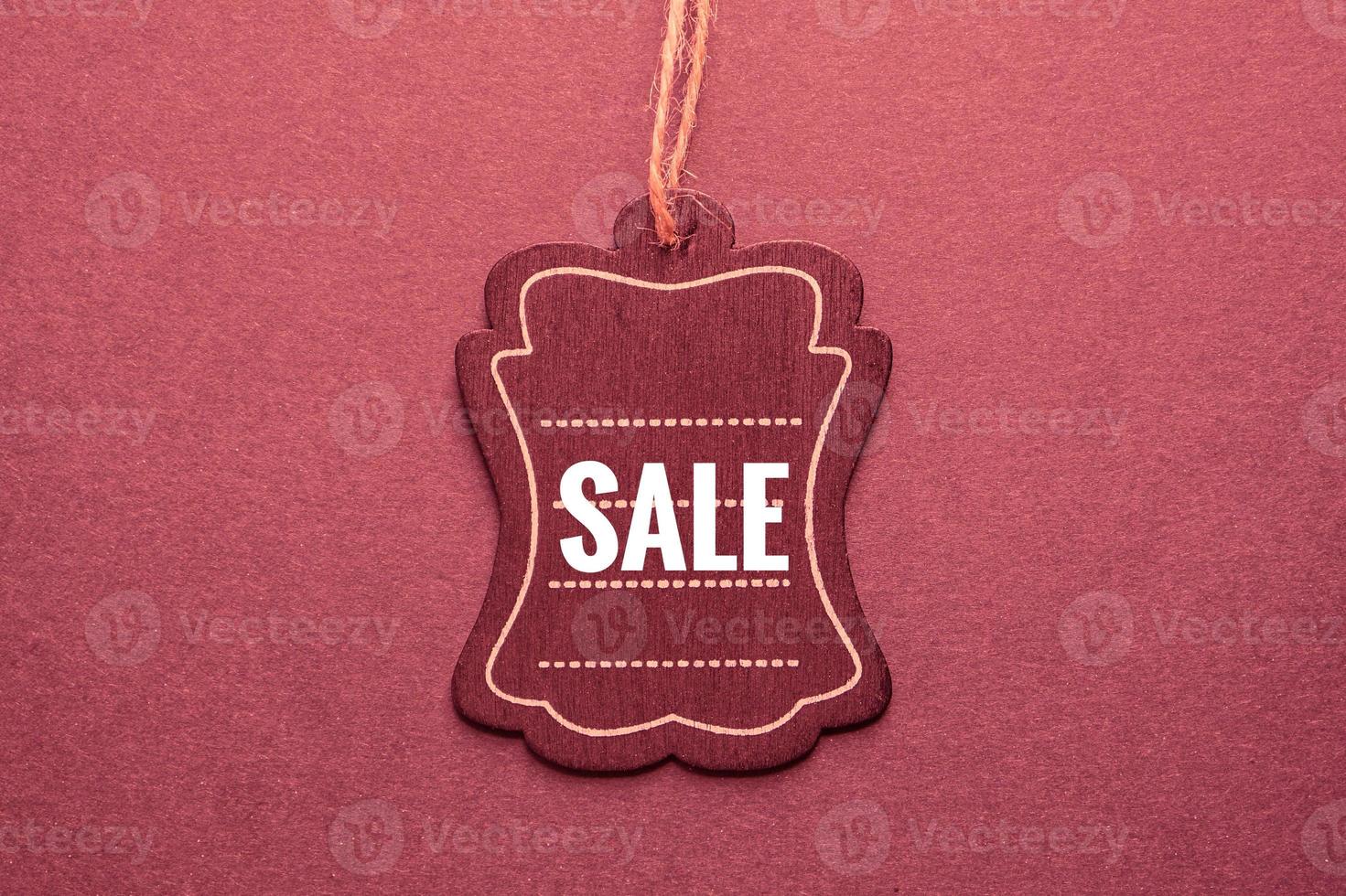 red price tag with sale sign on the red background, red mockup photo