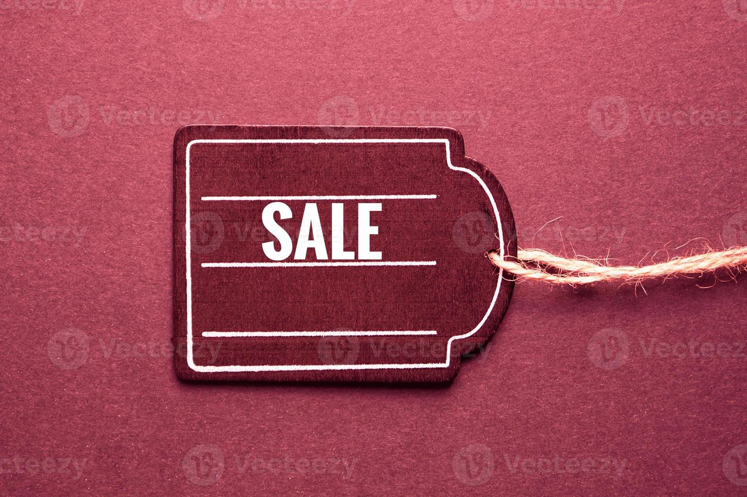 red price tag with sale sign on the red background, red mockup photo