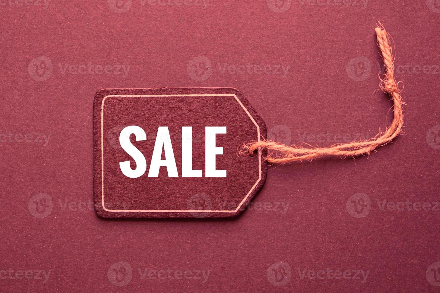 red price tag with sale sign on the red background, red mockup photo