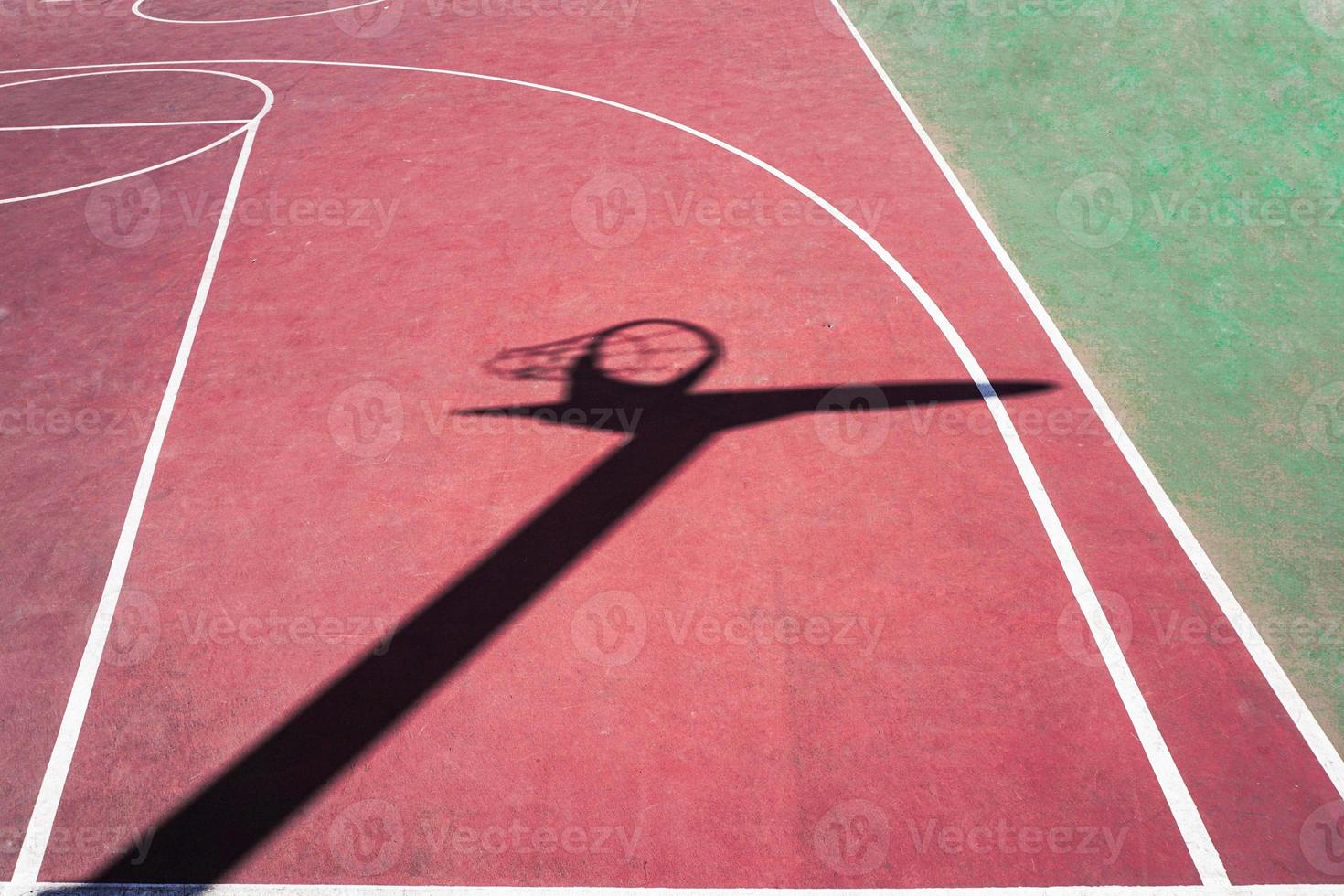 street basket shadow on the sports court photo