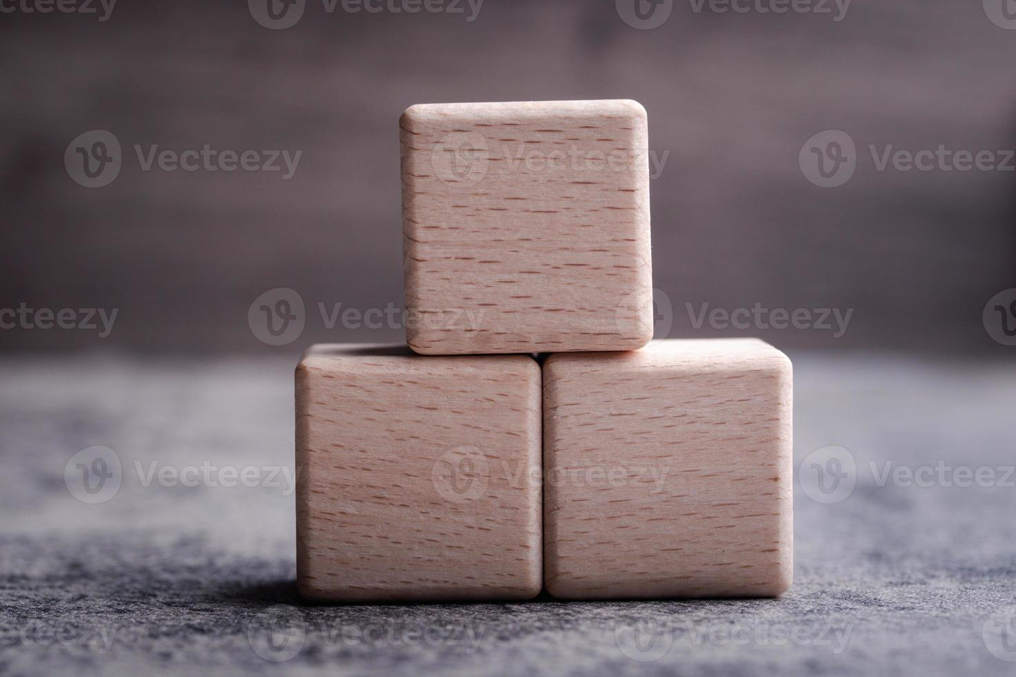 wooden blocks,on a brown background, Group of blank wooden blocks, cubes copy space for business text background such as idea, goal, plan concept photo